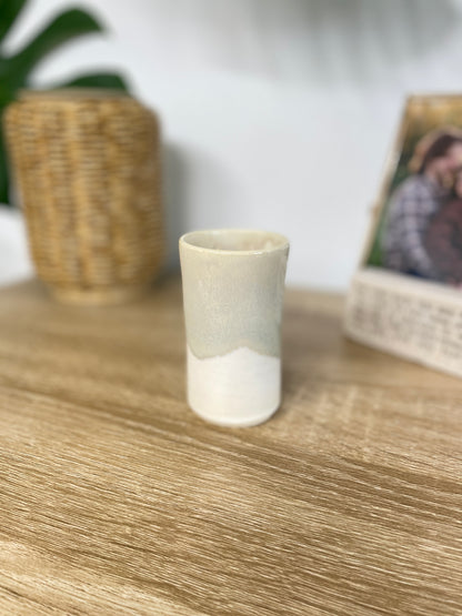 Light sage green and eggshell colored small ceramic bud vase
