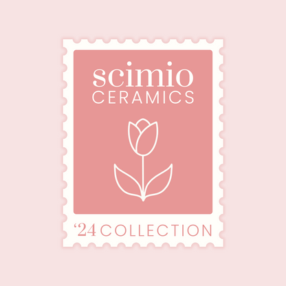 Pink two tone Scimio Ceramics logo that looks like a postage stamp with a drawing of a tulip.